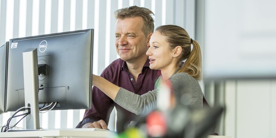 Beschäftigte von Vector an ihrem Arbeitsplatz