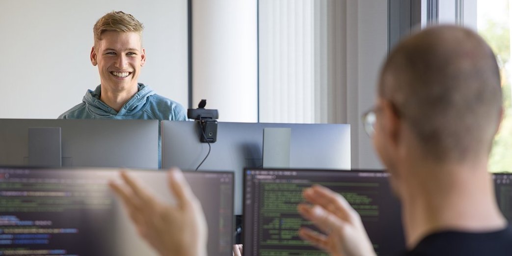 Two software developers in conversation