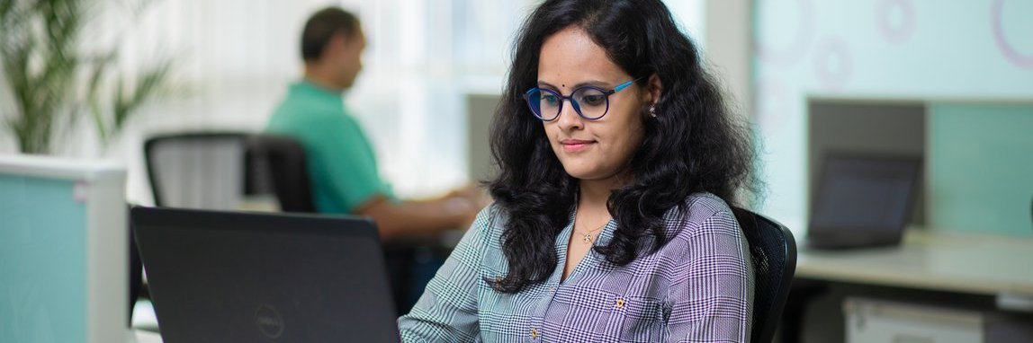 A Vector employee at her workplace
