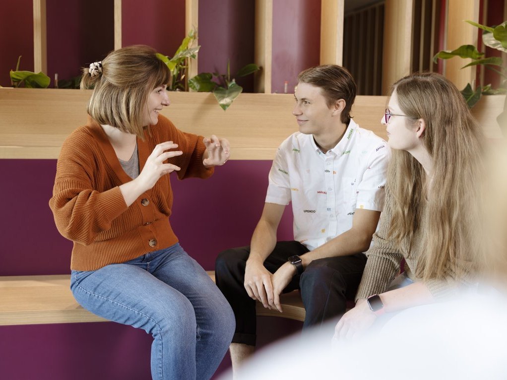 A group of Vector employees chatting