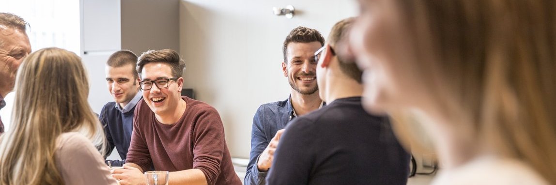 Vector employees during a conversation in the coffee kitchen
